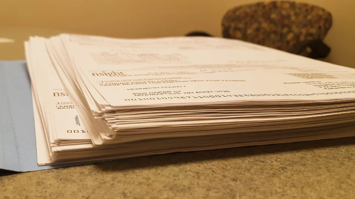 Stack of printed certificates and transcripts, part of the documents required to study in Turkey