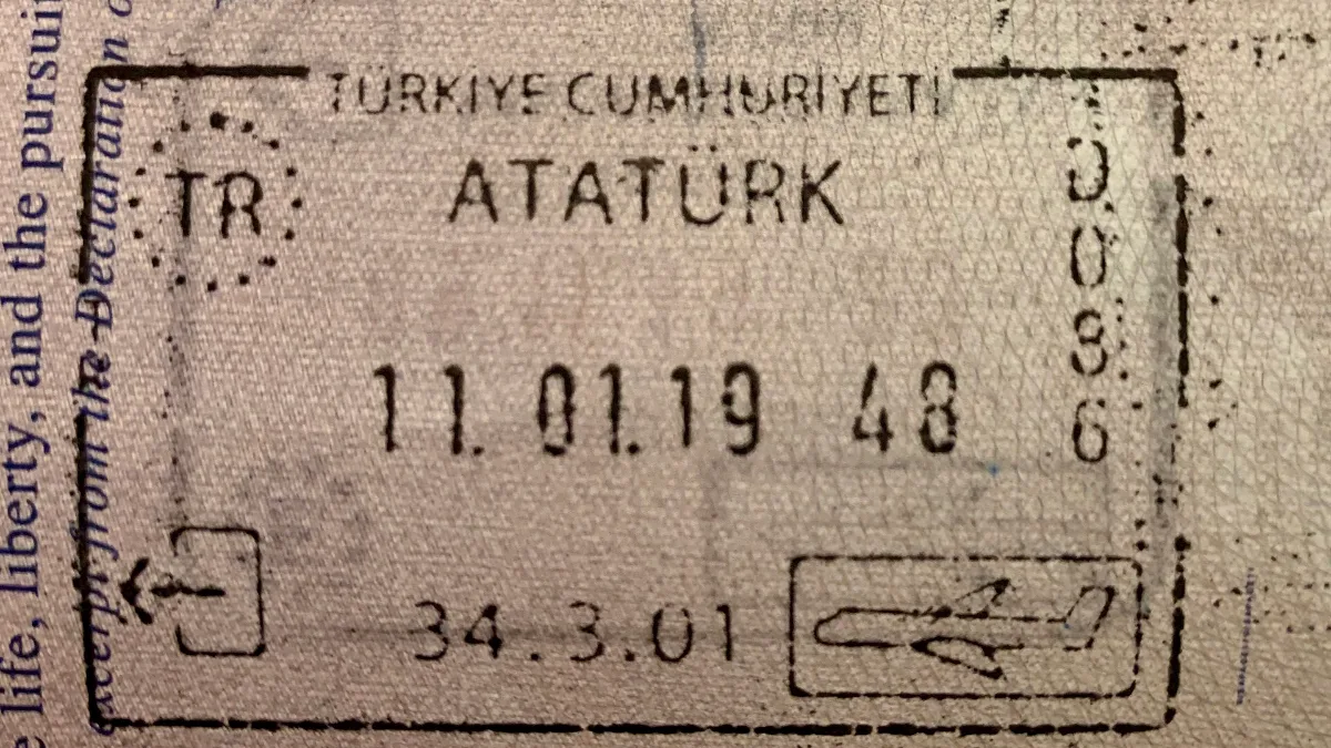 Turkish passport stamp from Istanbul Atatürk Airport, one of the travel documents students need to keep safe